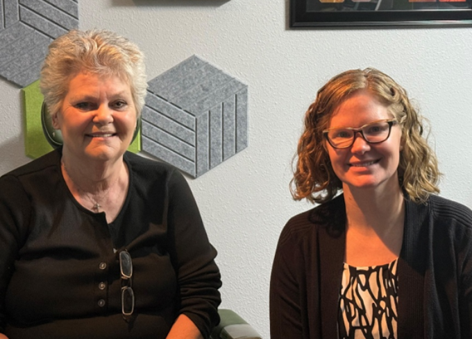 image of two women smiling for a photo
